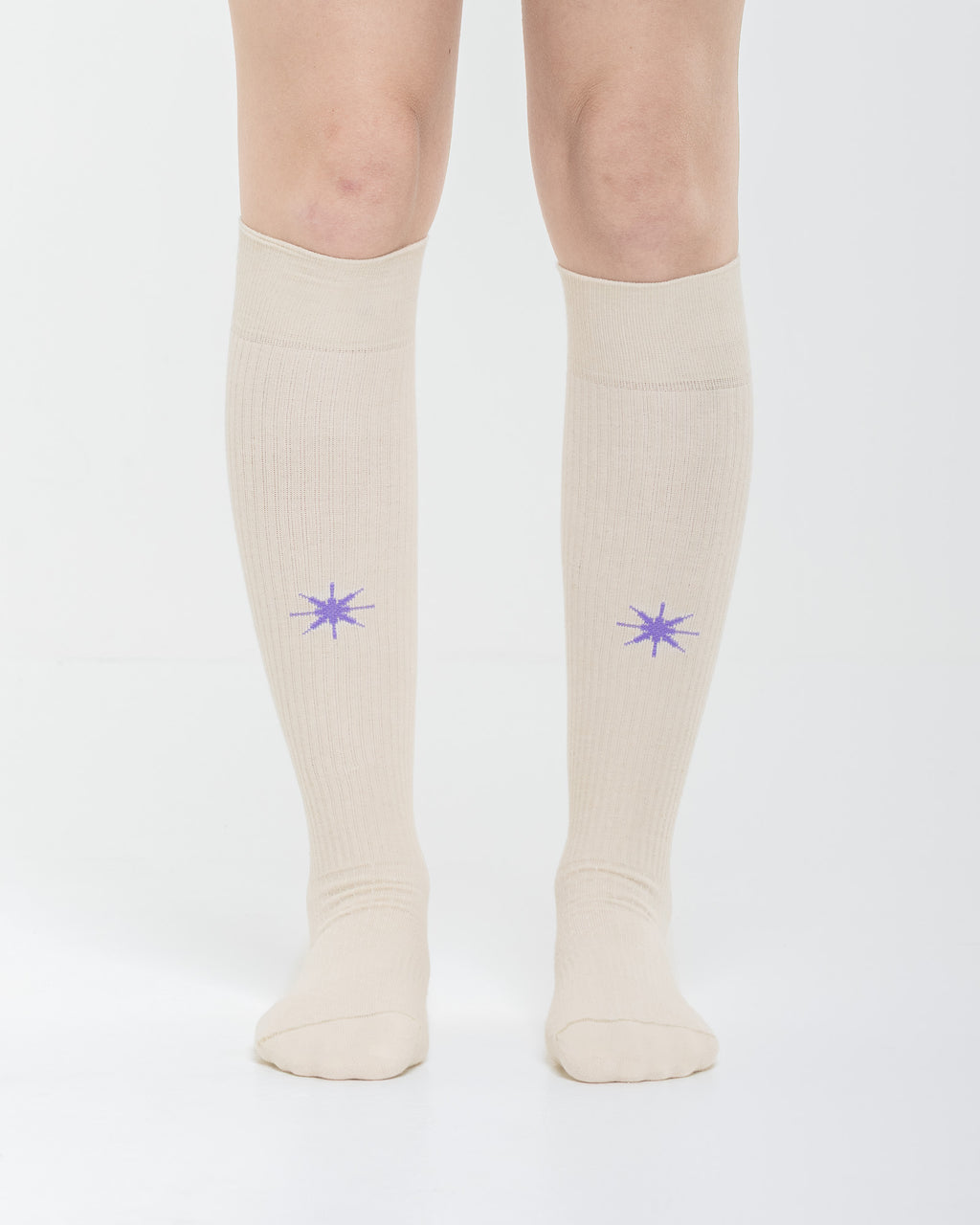 Cardo Radura Apex Knee High socks in ecru, front view showing the embroidered star detail.