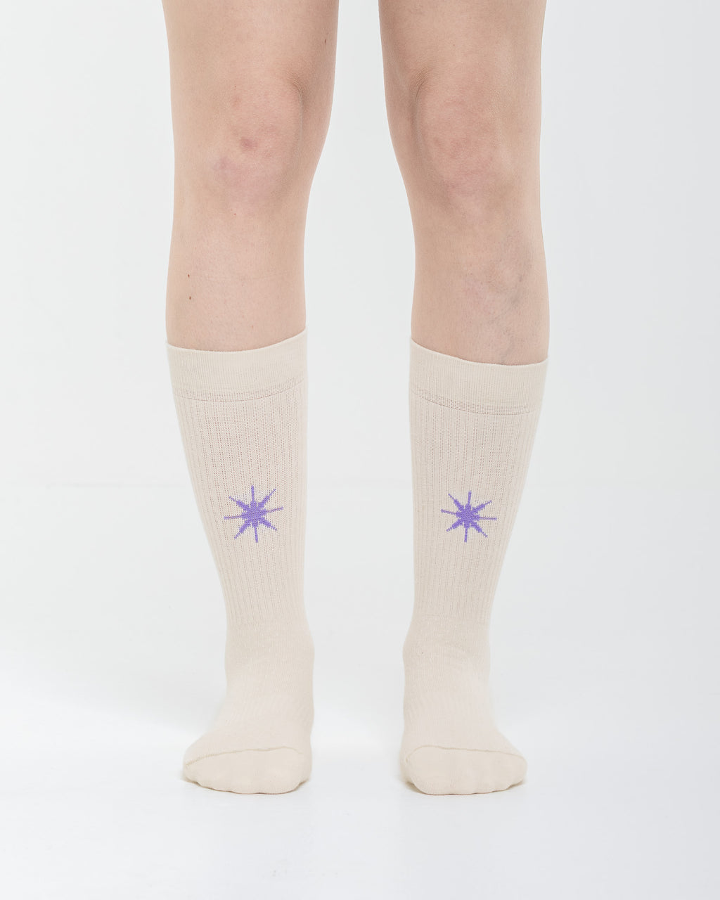 Cardo Radura Apex Half Calf socks in ecru, front view showing the embroidered star detail.