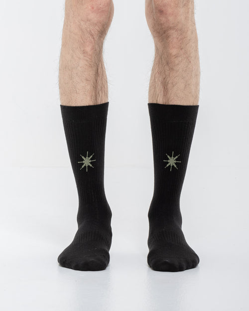 Cardo Radura Apex Half Calf socks in black, front view on a model against a white background.