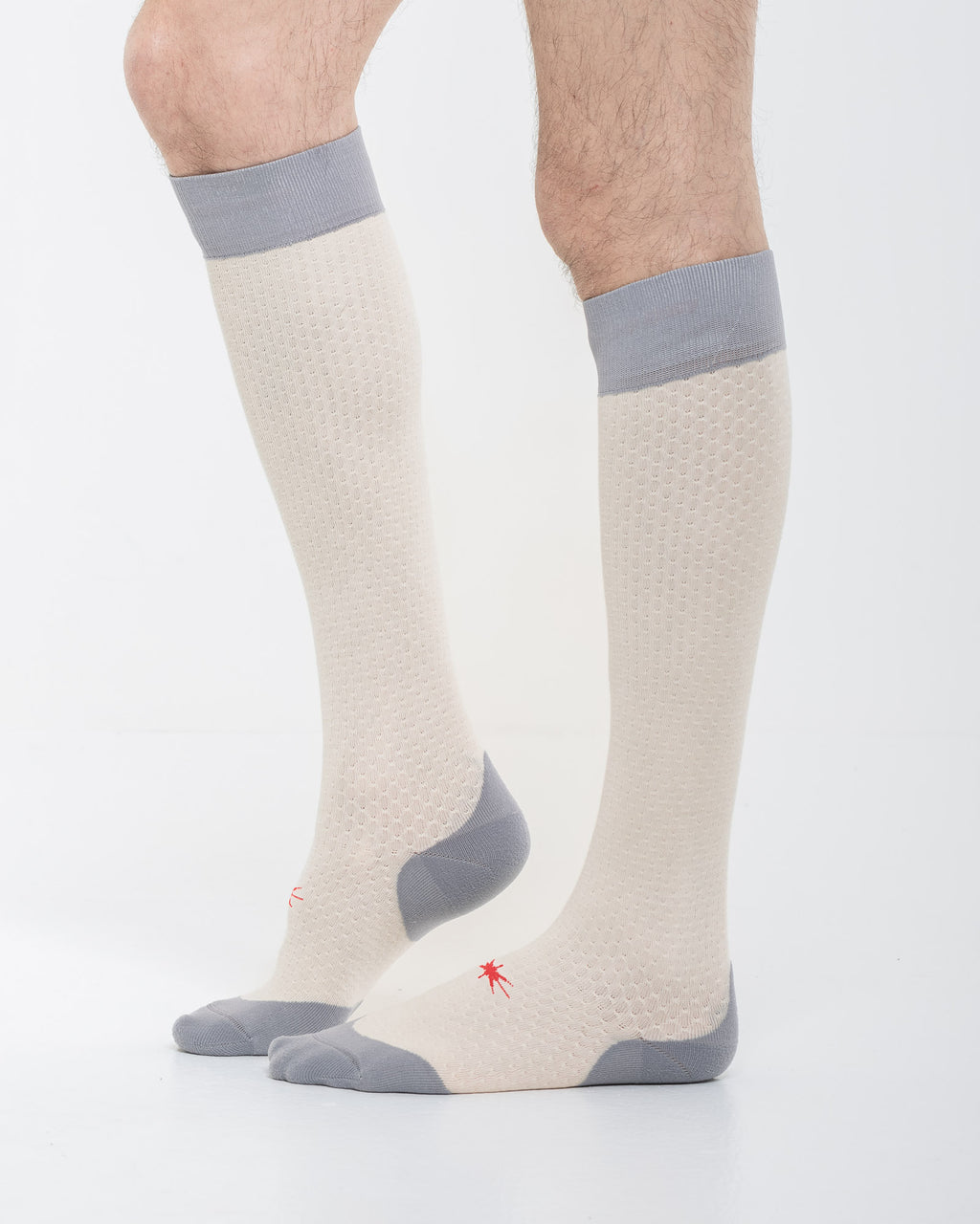 Cardo Radura Strata Lite Knee High socks in Stone, side view showing the grey cushioned heel and toe.