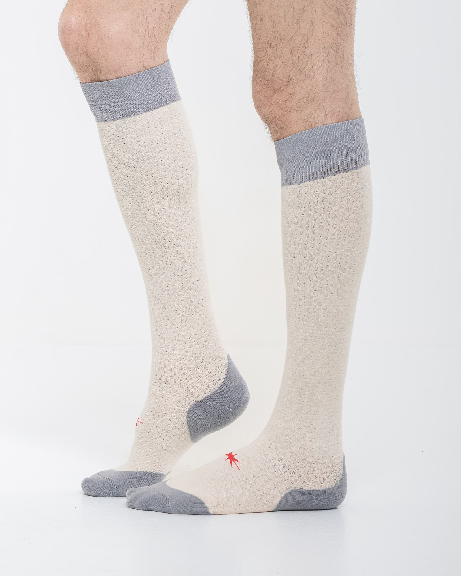 Cardo Radura Strata Lite Knee High socks in Stone, side view showing the grey cushioned heel and toe.