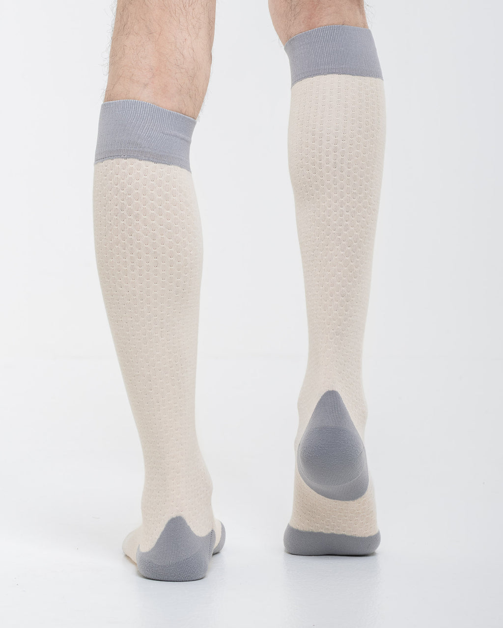 Cardo Radura Strata Lite Knee High socks in Stone, rear view showing the grey reinforced heel.