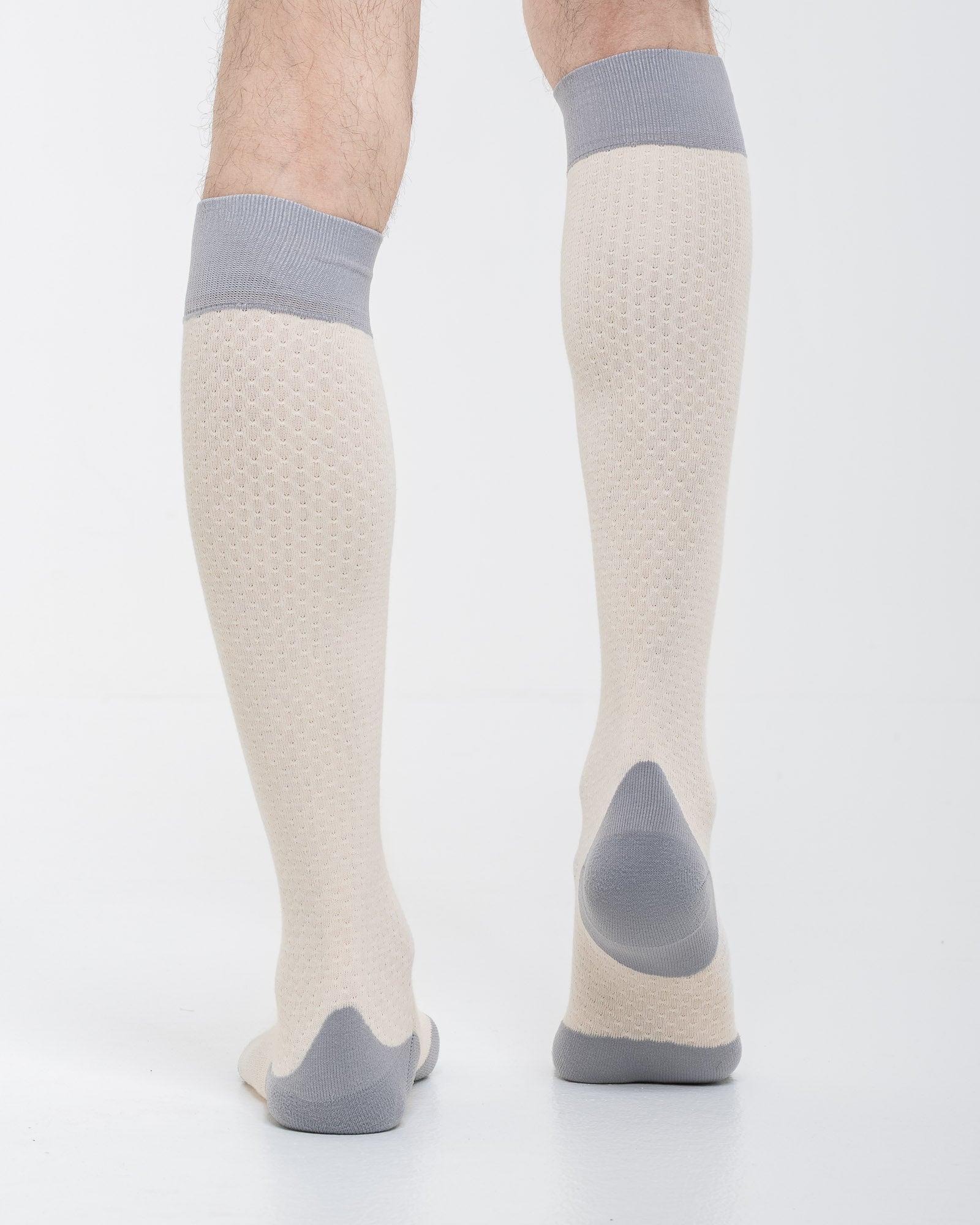 Cardo Radura Strata Lite Knee High socks in Stone, rear view showing the grey reinforced heel.