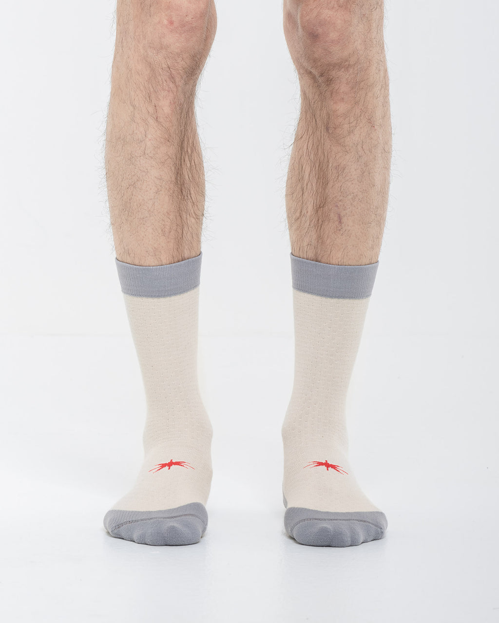 Cardo Radura Strata Lite Half Calf socks worn by a model against a white background.