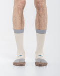 Cardo Radura Strata Half Calf socks worn by a model against a white background.