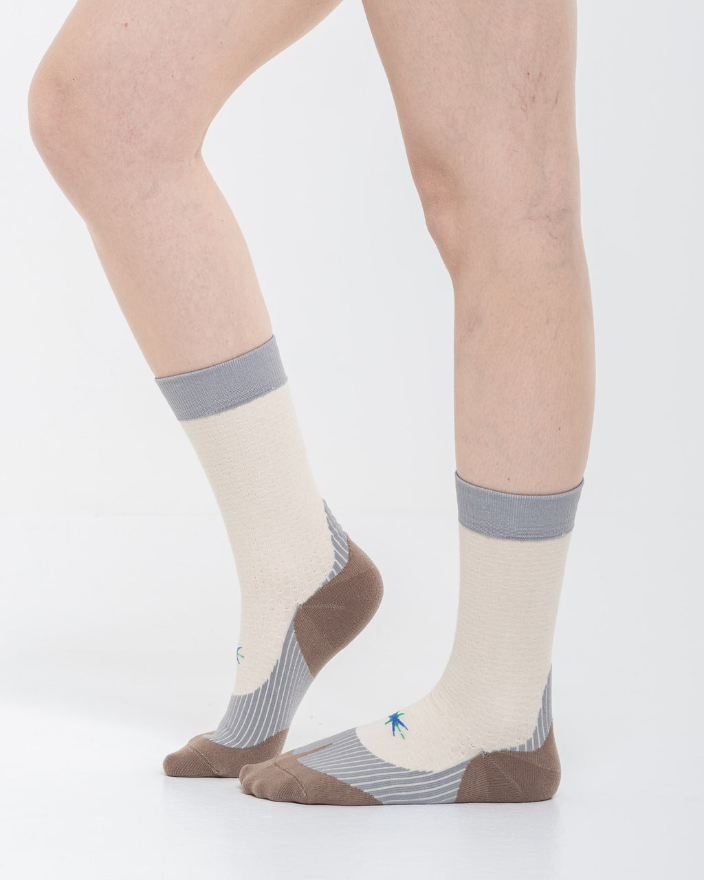Cardo Radura Strata Half Calf socks in ecru, grey and brown, side view showing the cushioned sole and heel.
